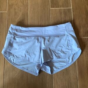 Size 6 light blue lined shorts. Zipper pocket on back. Stretchy.